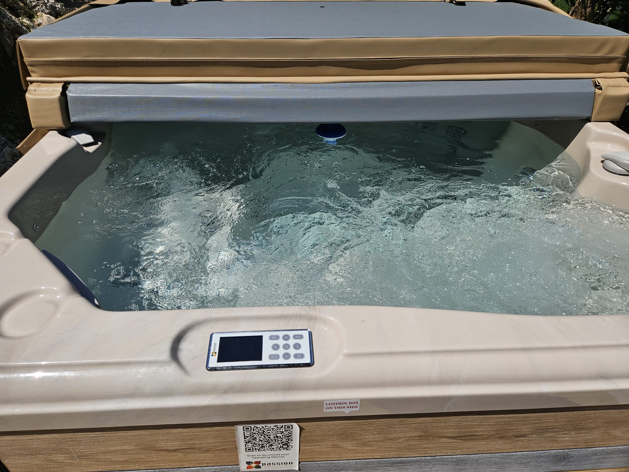 Crane-assisted whirlpool transfer across the villa access zone
