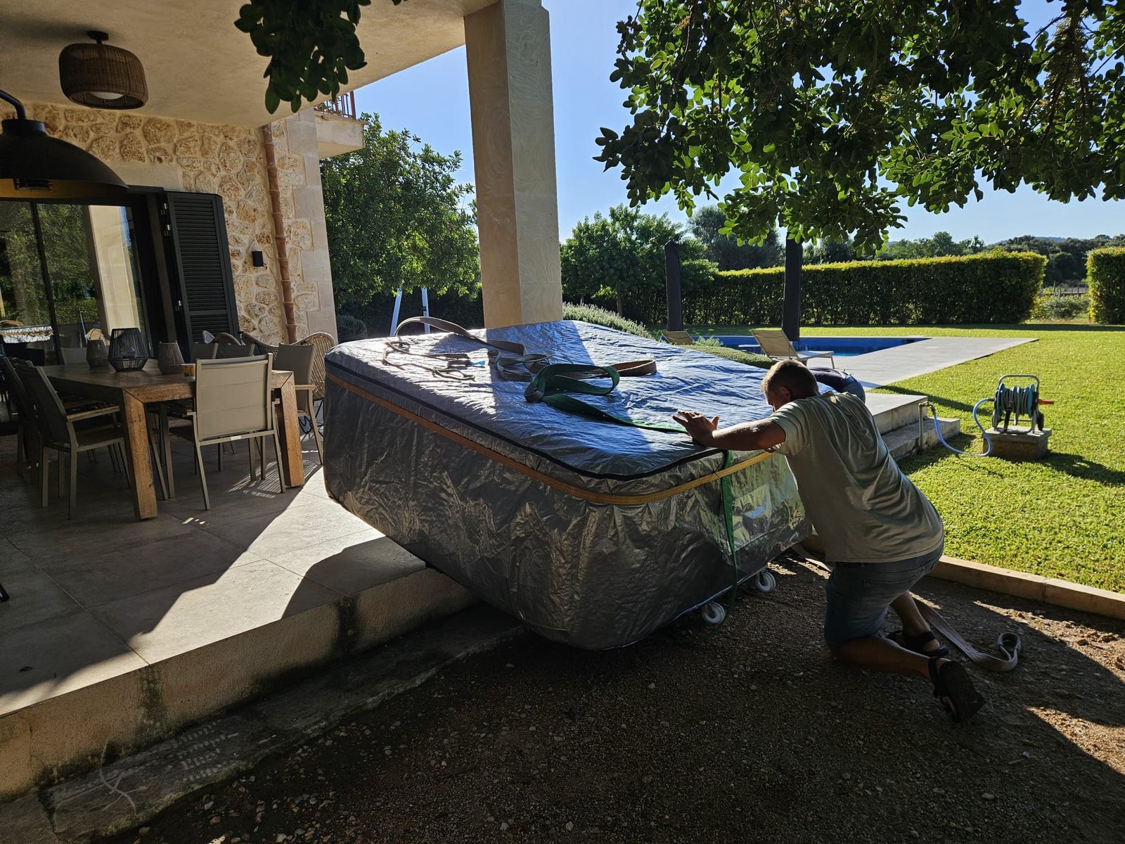 The whirlpool moved into position on the terrace beside the pool