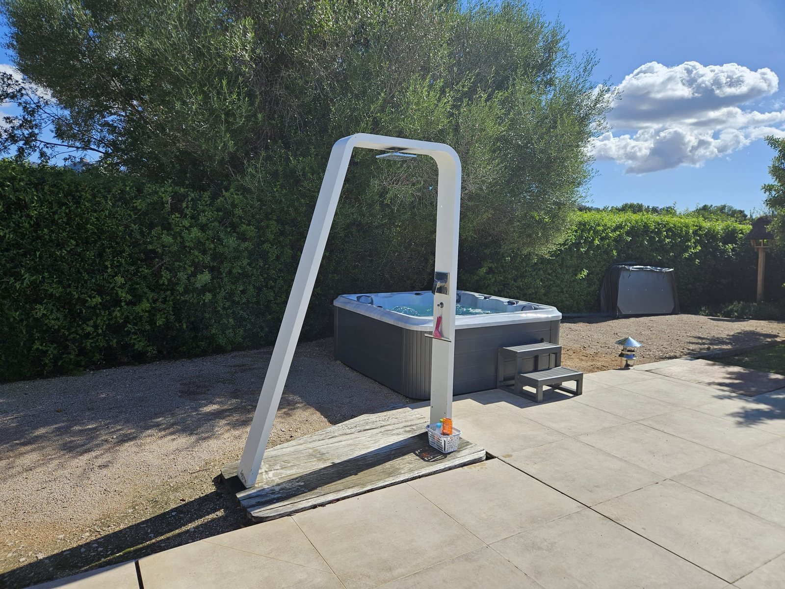 The finished Waterwave BS 302 whirlpool beside the pool at Casa Viduleto, Felanitx