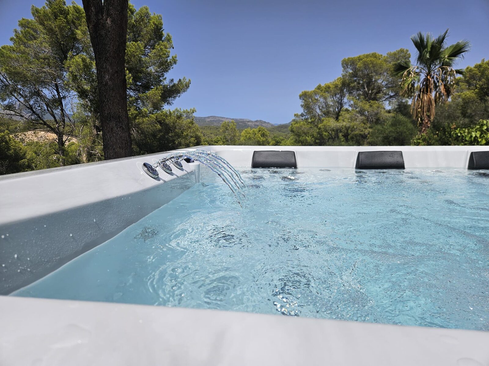 The new spa with waterfall feature and countryside view at Costa de la Calma