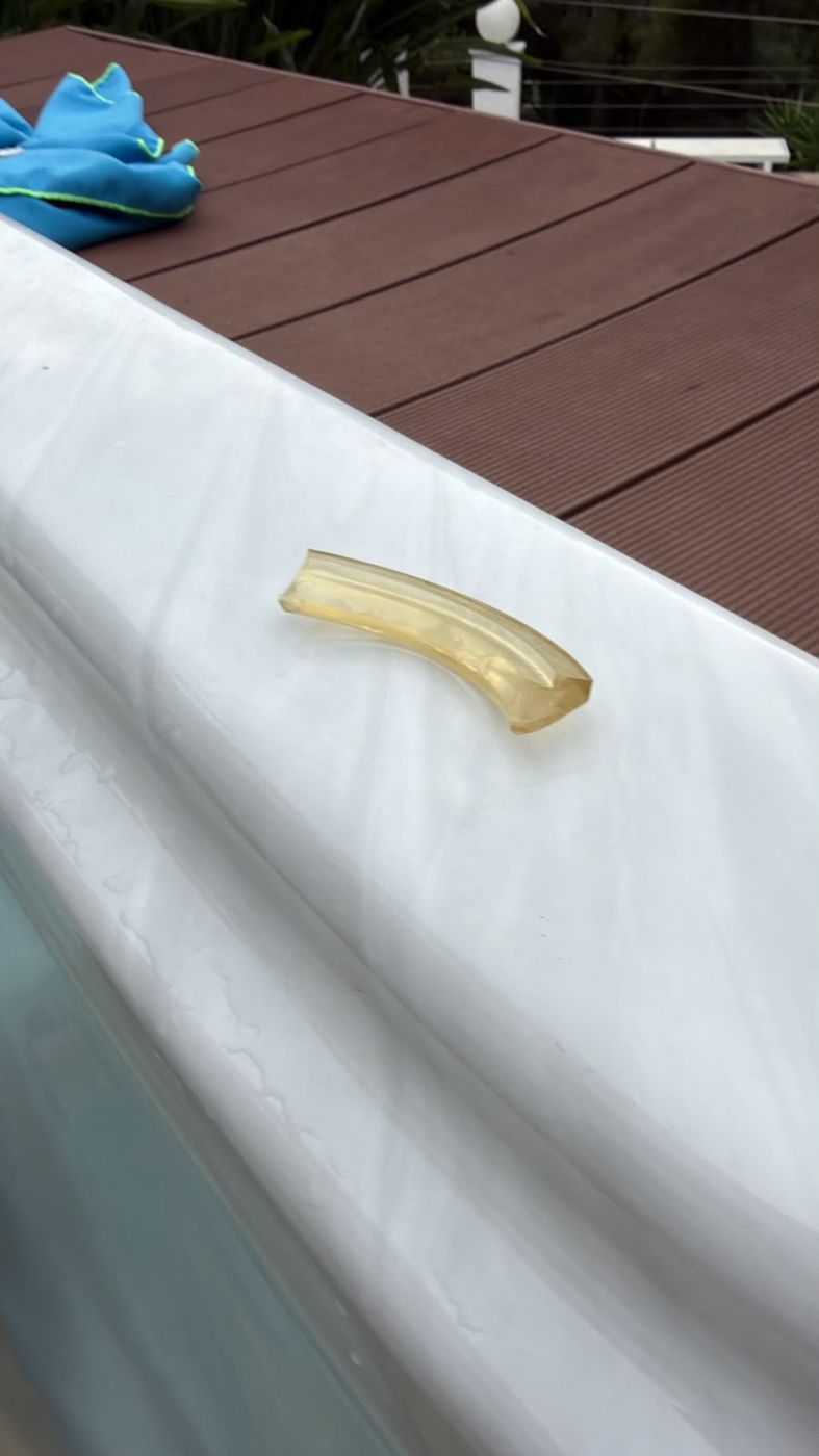 Broken piece of lamp glass found floating in the whirlpool in Costa de la Calma, Mallorca