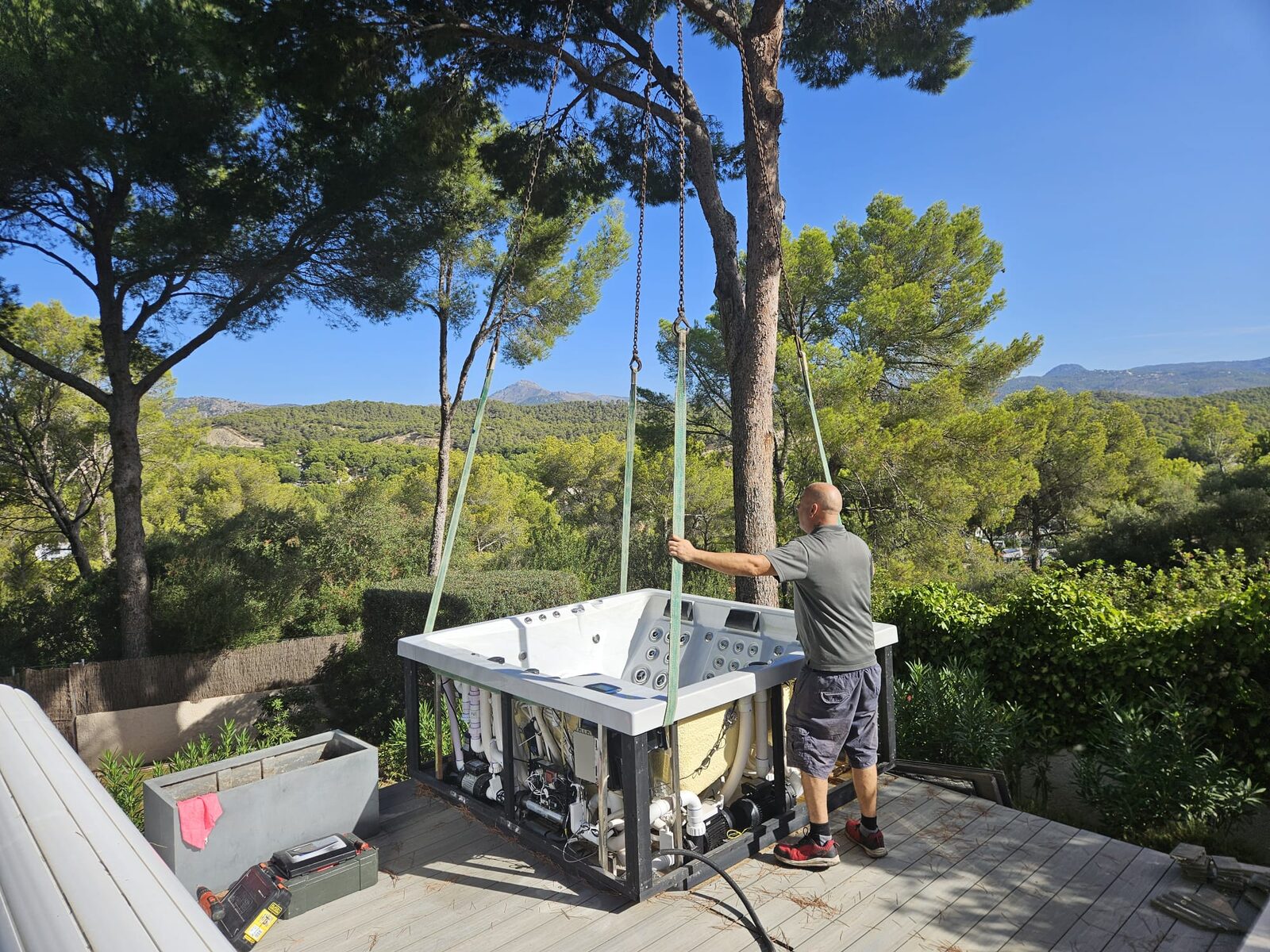 New spa guided into its final position on the terrace