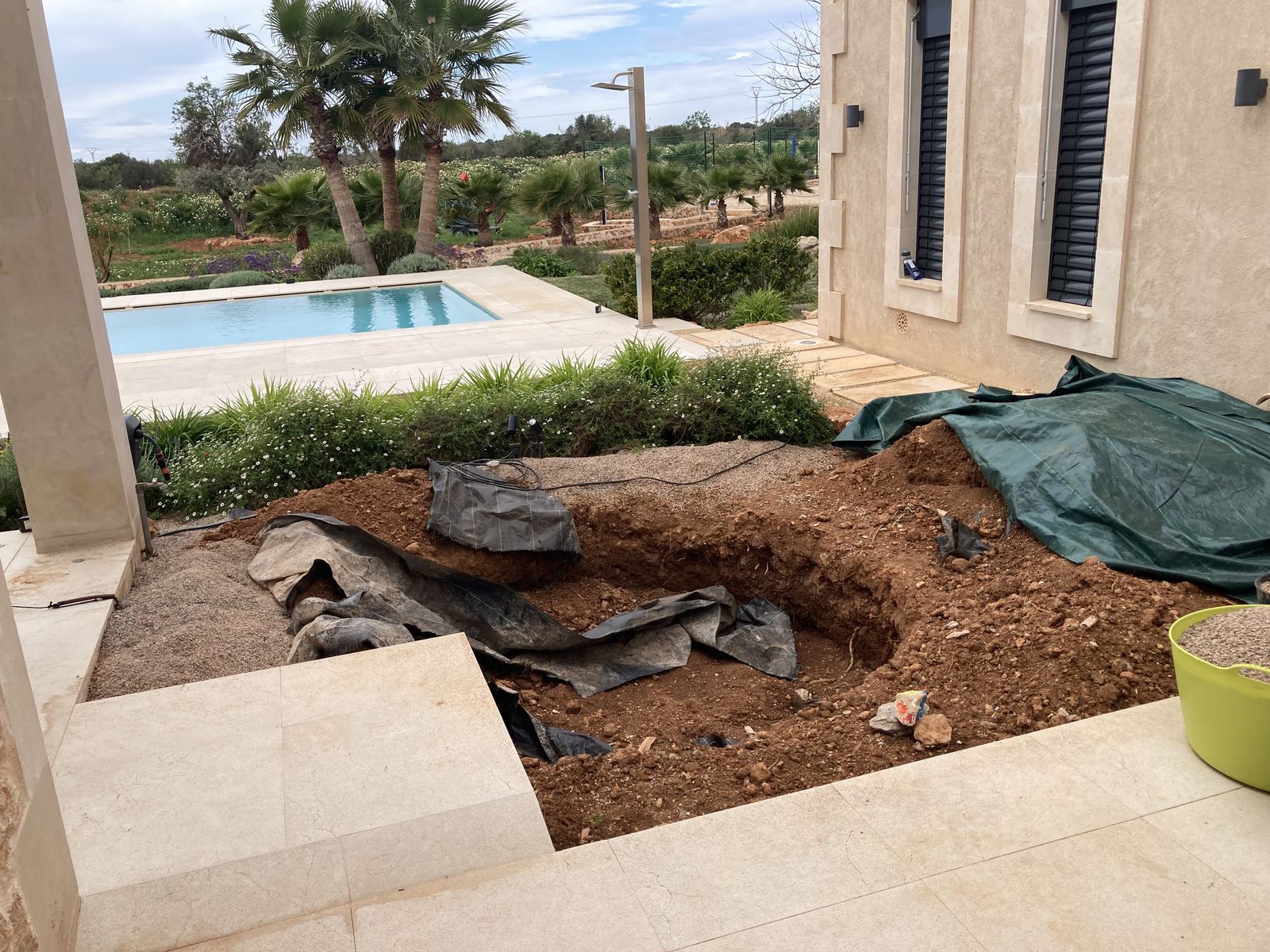 Sunken whirlpool excavation process on terrace in Mallorca