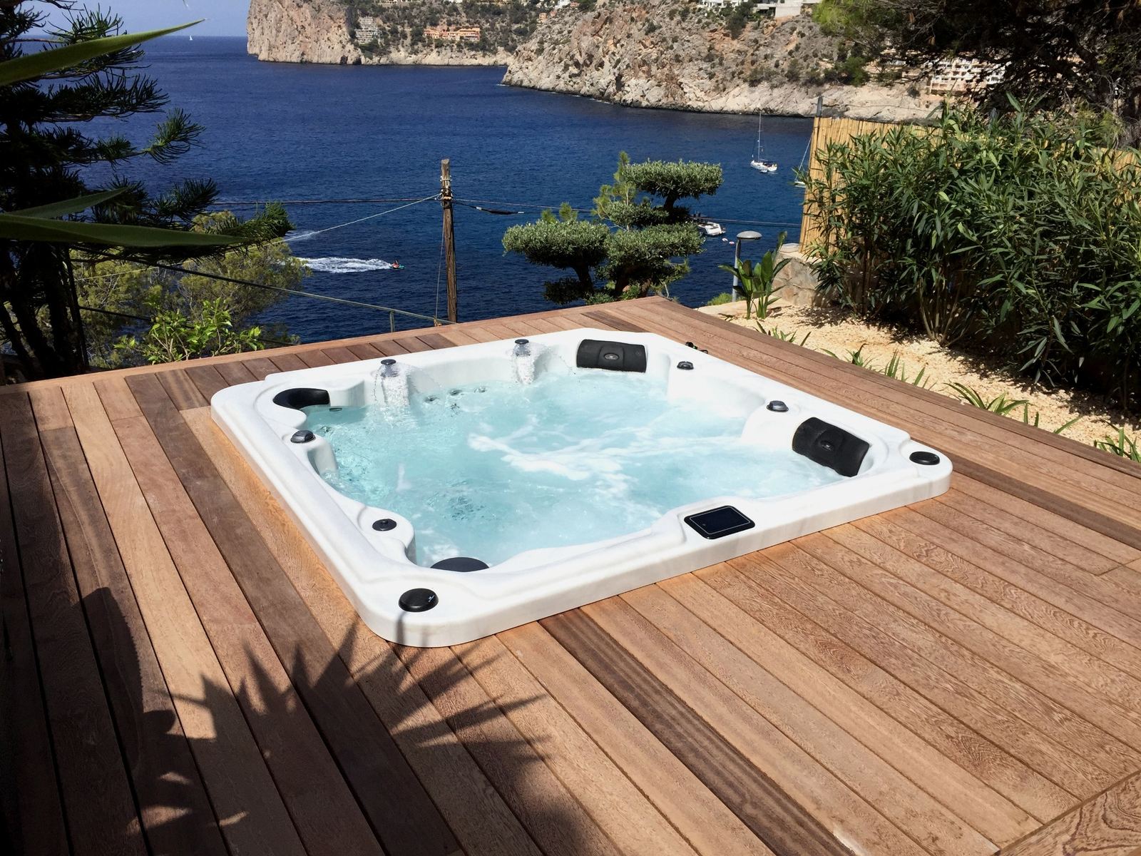Terrace spa on a wooden deck with sea view in Bendinat